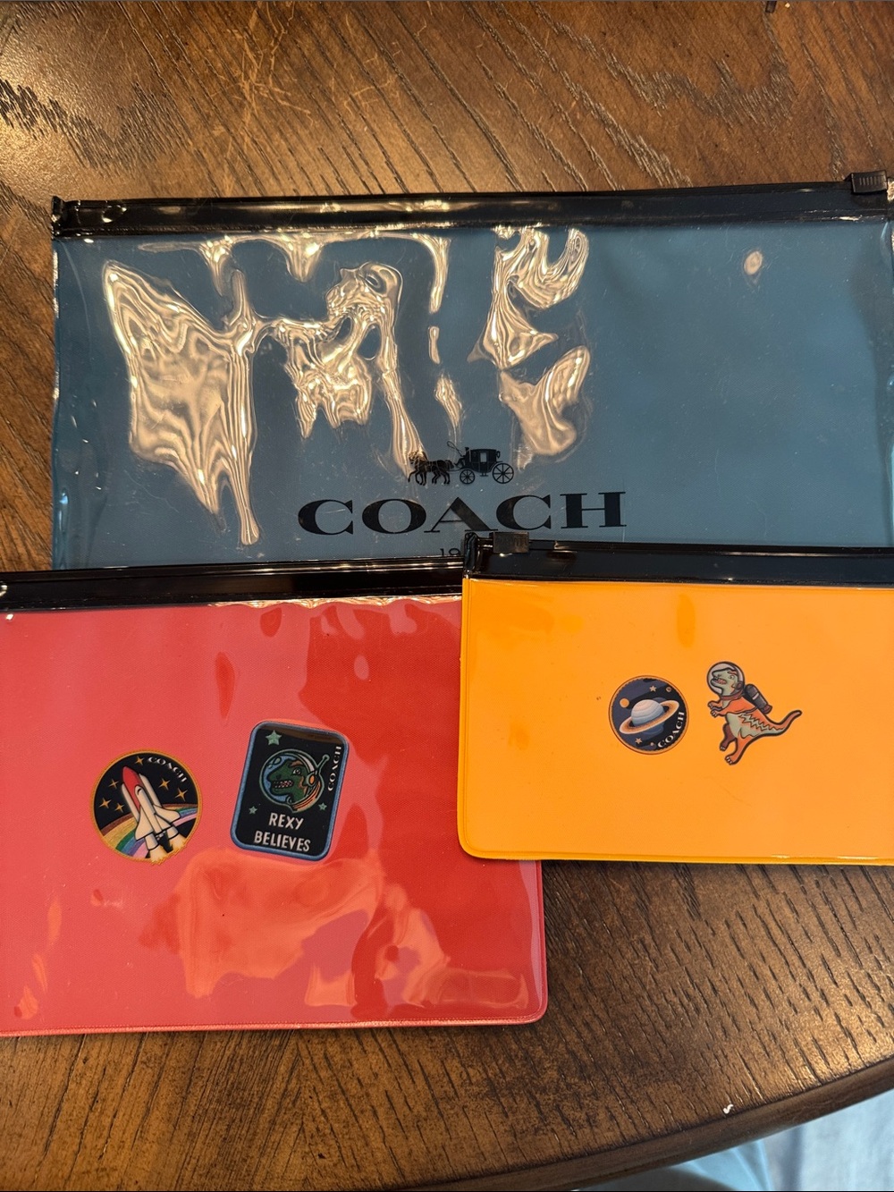 Coach Vinyl Rexy Pouch Trio in Blue, Coral and Orange